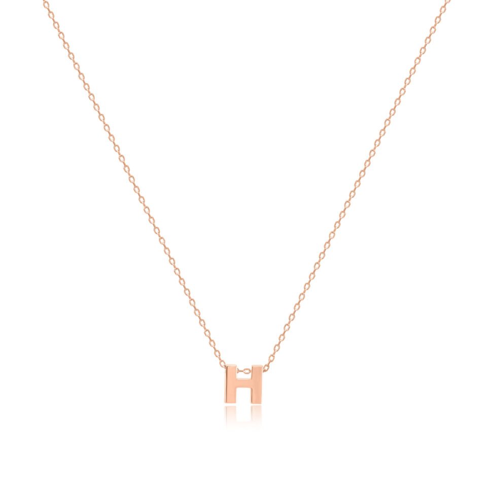 Złoty łańcuszek z zawieszką w kształcie litery "H"