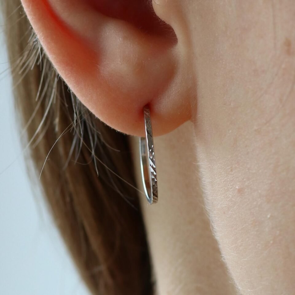 Valgest kullast kõrvarõngad "Rinkės"