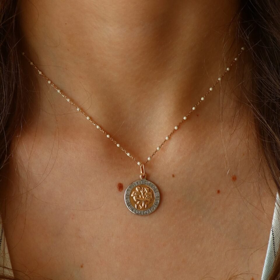 Kuldne ripats sodiaagimärgiga "Kaksikud"