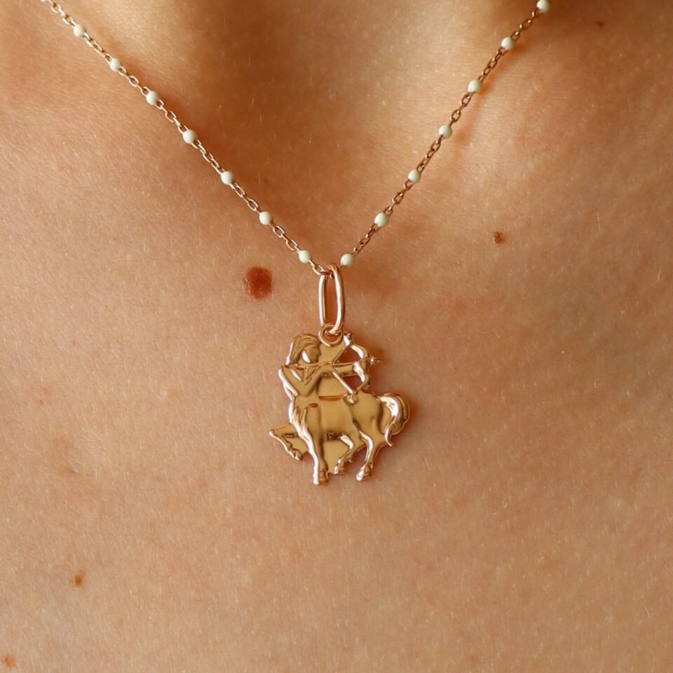 Kuldne ripats sodiaagimärgiga "Ambur"