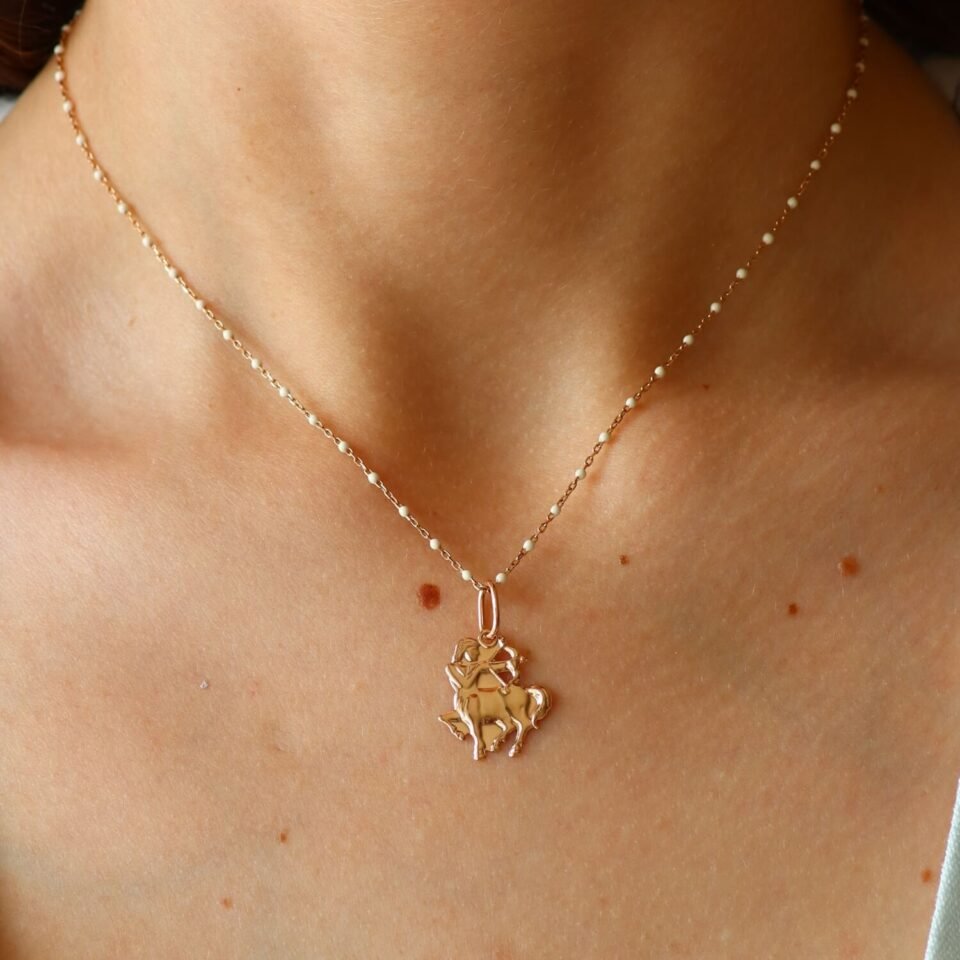 Kuldne ripats sodiaagimärgiga "Ambur"